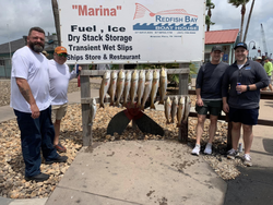 Two anglers fishing in Aransas Pass