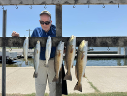 4 redfish and spotted weakfish, fishing in TX
