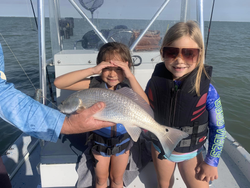 Redfish caught by 2 anglers in Aransas Pass