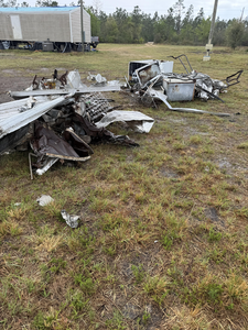 Storm aftermath leaves fishing boat debris in Panama City.