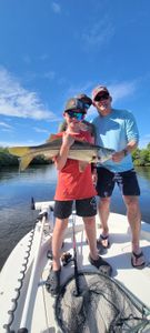 Two anglers enjoying a fishing trip in Bonita Springs