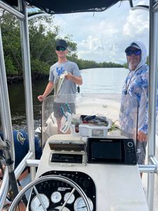 Two people fishing at Bonita Springs