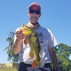 Angler fishing in unknown location