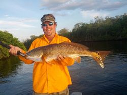 Fisherman with a 30-inch catch
