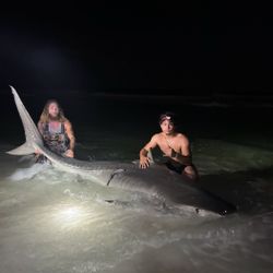 2 people fishing together in Destin