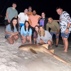 A group of 11 people fishing in Destin