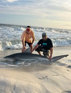 Two people fishing in Destin