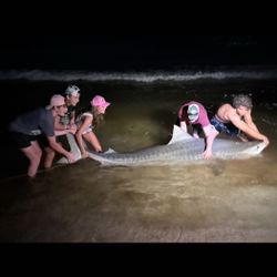 A group of 3 people enjoying fishing in Destin
