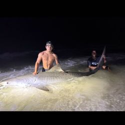Two people fishing in Destin