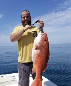 Fishing Charter and a trophy Red Snapper in Biloxi