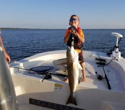 Angler with a 34-inch redfish in MS