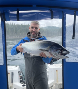 A lone angler fishing in British Columbia