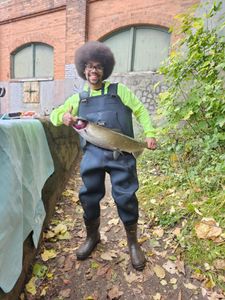 Angler with 18-inch fish in Newaygo County