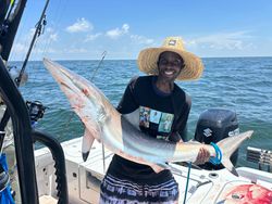 3 people enjoying a fishing cruise in MS