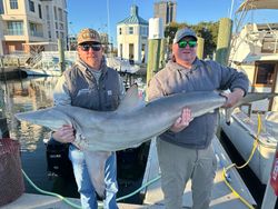 A couple enjoying a fishing cruise in Gulfport