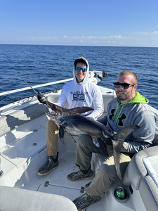Relaxing day on the water reeling them in.