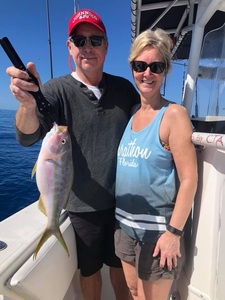 Two anglers enjoying a day of fishing in Marathon, Florida