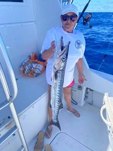 Angler with a 27-inch fish caught in Marathon