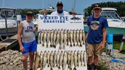 Three people enjoying a fishing trip in OH