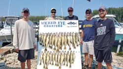 Five people enjoying fishing trip in OH