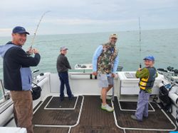 Four people enjoying a fishing trip in OH