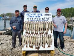 5 people fishing with 2 fish in Marblehead