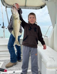 Angler holding a 26-inch fish in Marblehead