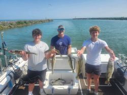 Three people fishing for a great catch in Ohio
