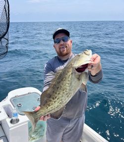 Angler holding fishing rod in FL