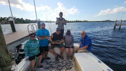 A group of 6 people fishing at Port Richey