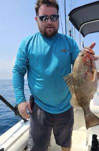A person fishing at Port Richey