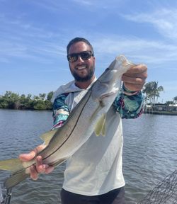 A person fishing in FL