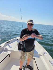 Great catch using deep sea jigging and heavy tackle in clear conditions!