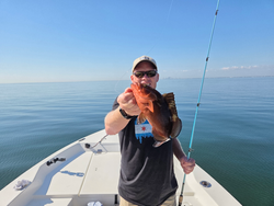 Nice red grouper using deep sea jigging techniques in these clear conditions!