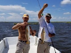 Two anglers enjoying fishing in LA