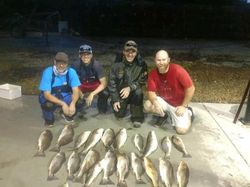 Four people fishing in Saint Bernard
