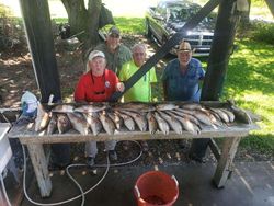 4 people fishing in the scenic Saint Bernard area
