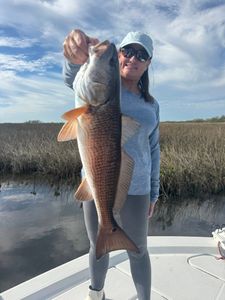 A person fishing in FL