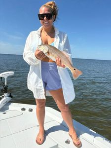 Redfish caught in Florida by two anglers fishing