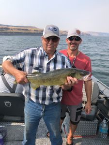 Two people fishing in Oregon