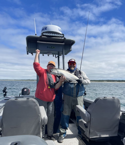 Successful angler catches a fish in Astoria
