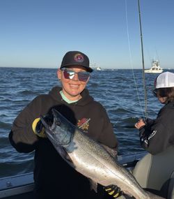 Angler with fishing rod enjoying outdoor adventure in OR