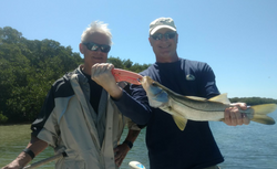Two people fishing in FL
