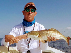 Angler with a 17-inch fish catch in FL