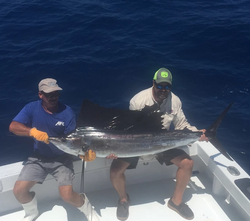 Anglers with a big fish in Islamorada