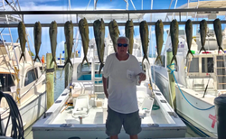 Angler with 13 big fish on a fishing trip in FL