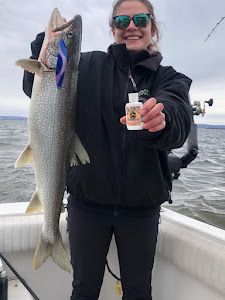A person fishing on a lake in Minnesota