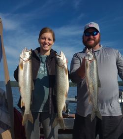 Three lake trout caught on the Knife River