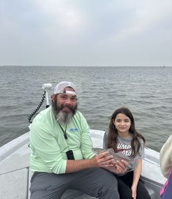 Two people fishing in Aransas Pass
