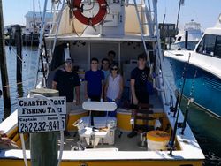 Six people enjoying a fishing trip in North Carolina
